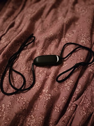 Customer photo of the anti-snoring device on patterned fabric